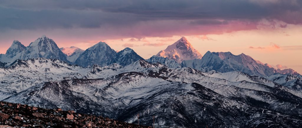 mountain range with snow covering the mountains