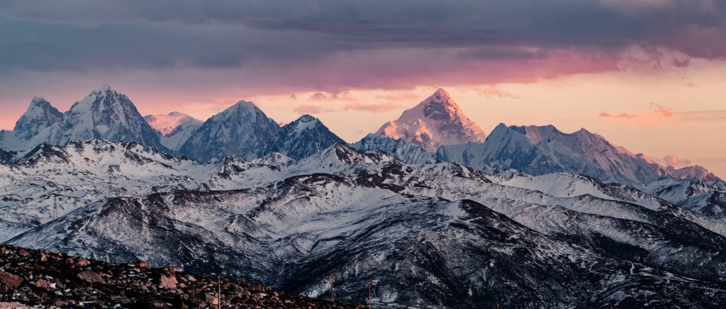 mountain range with snow covering the mountains